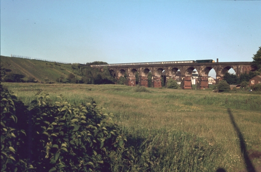 Train travelling over Sankey Viaduct